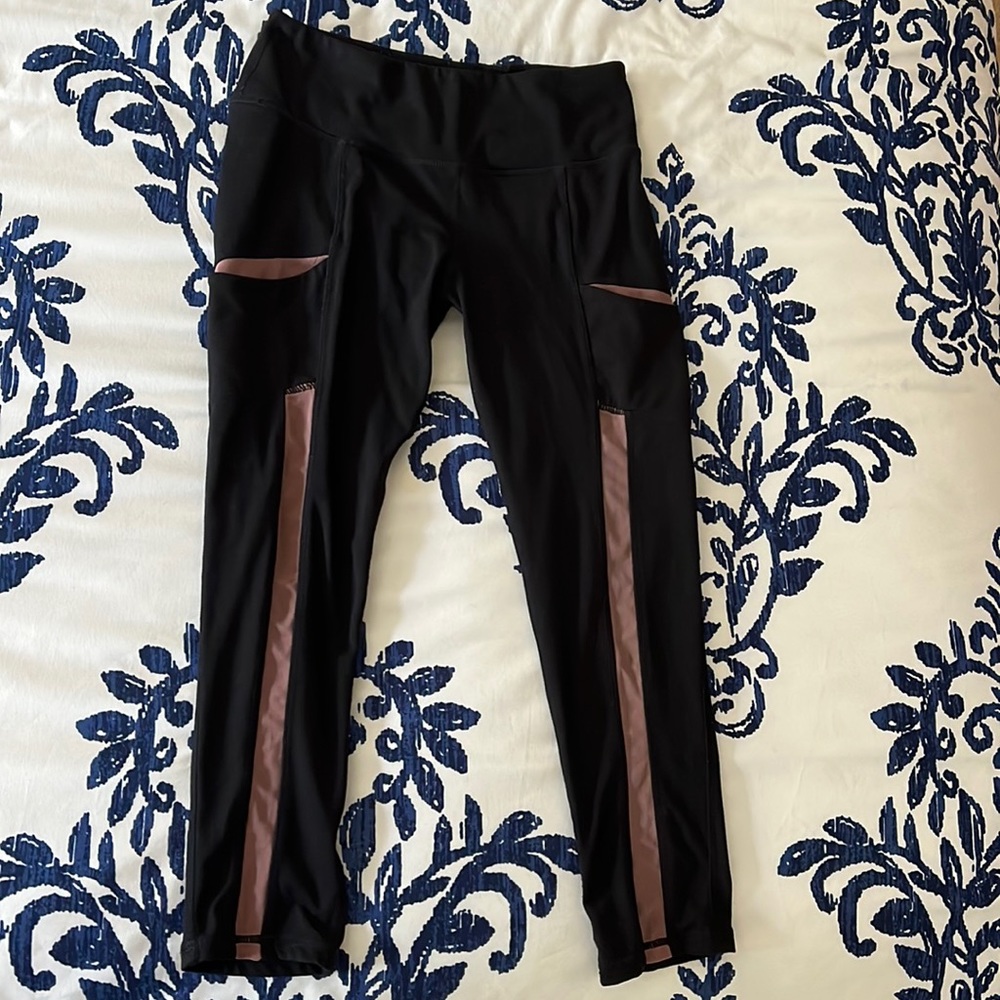 Black leggings with mesh strips